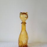 Zoomorphic carafe in amber glass