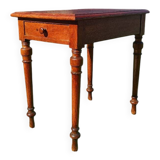 Antique solid wood table with a through drawer.