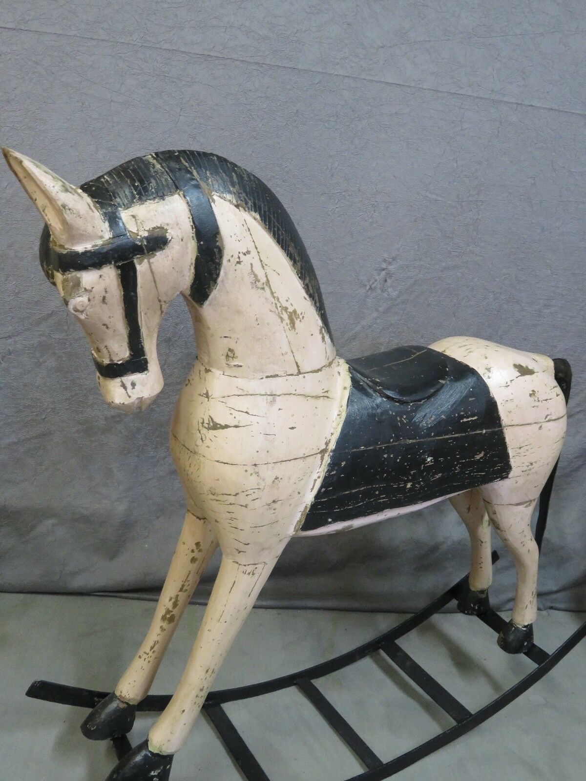 Powder pink and black rocking wooden horse