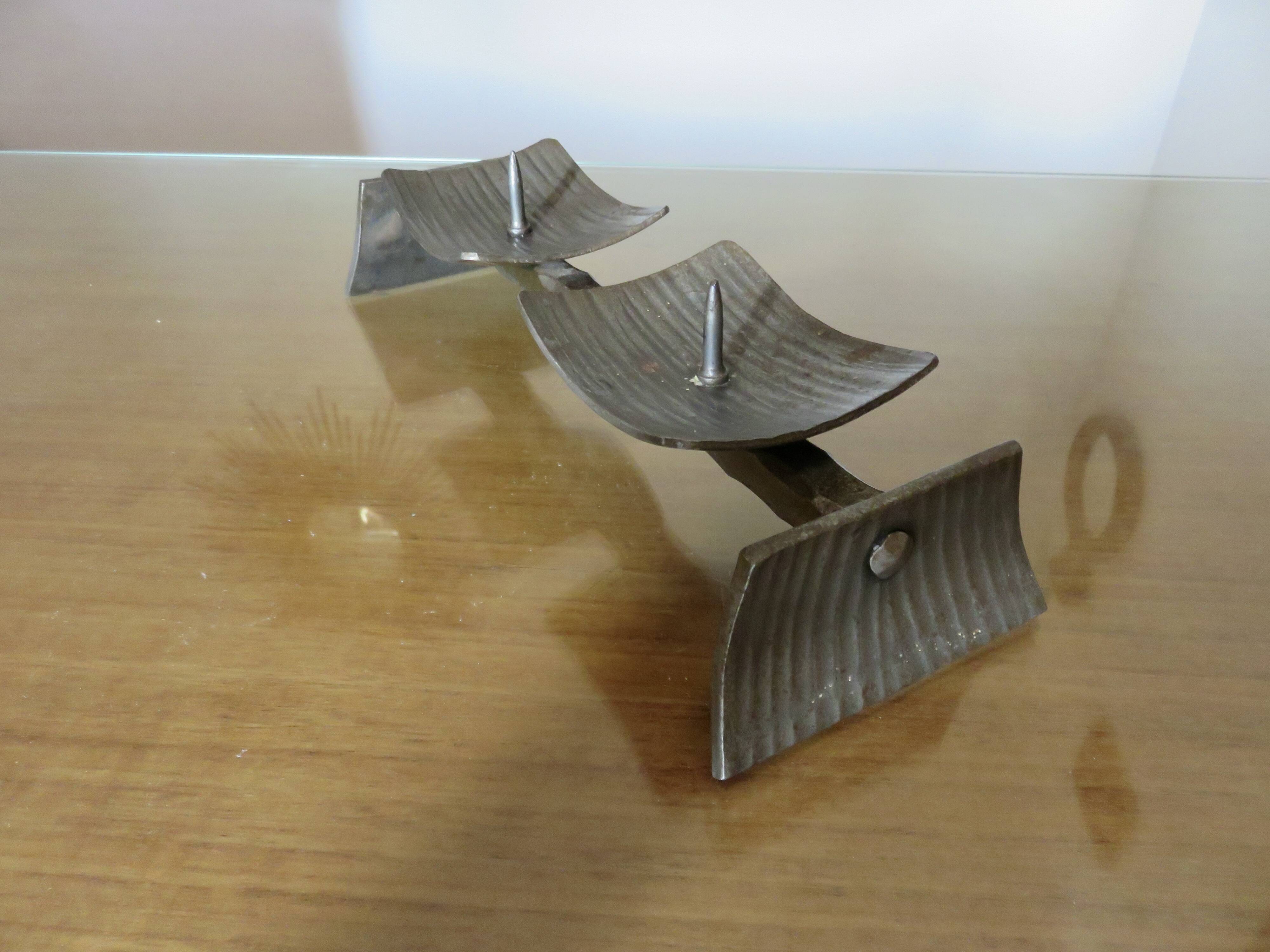 Large brutalist candlestick in the style of the Marolles workshops, raw steel.