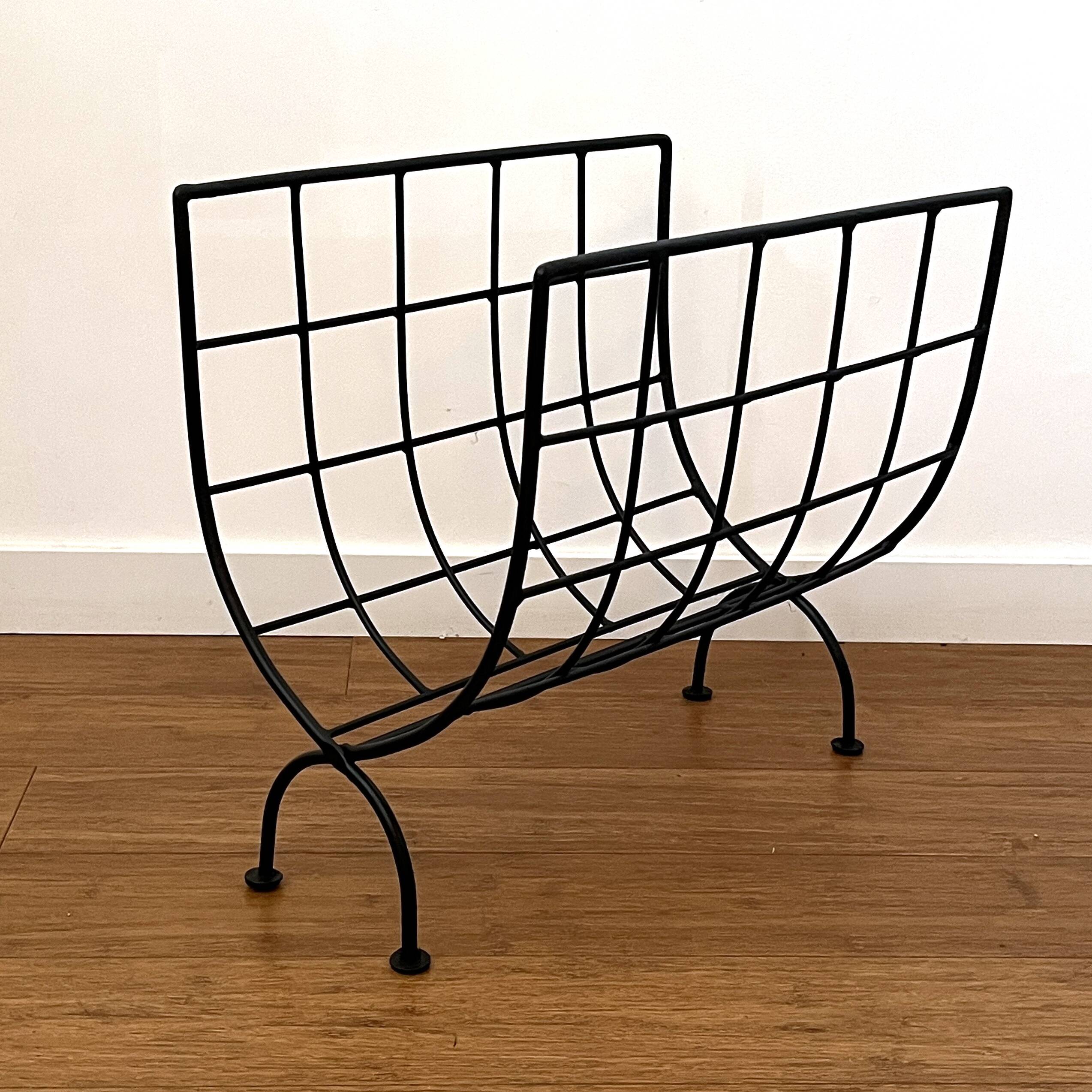 Black metal magazine rack