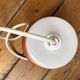 Sputnik pendant light, dark orange ring on white tube