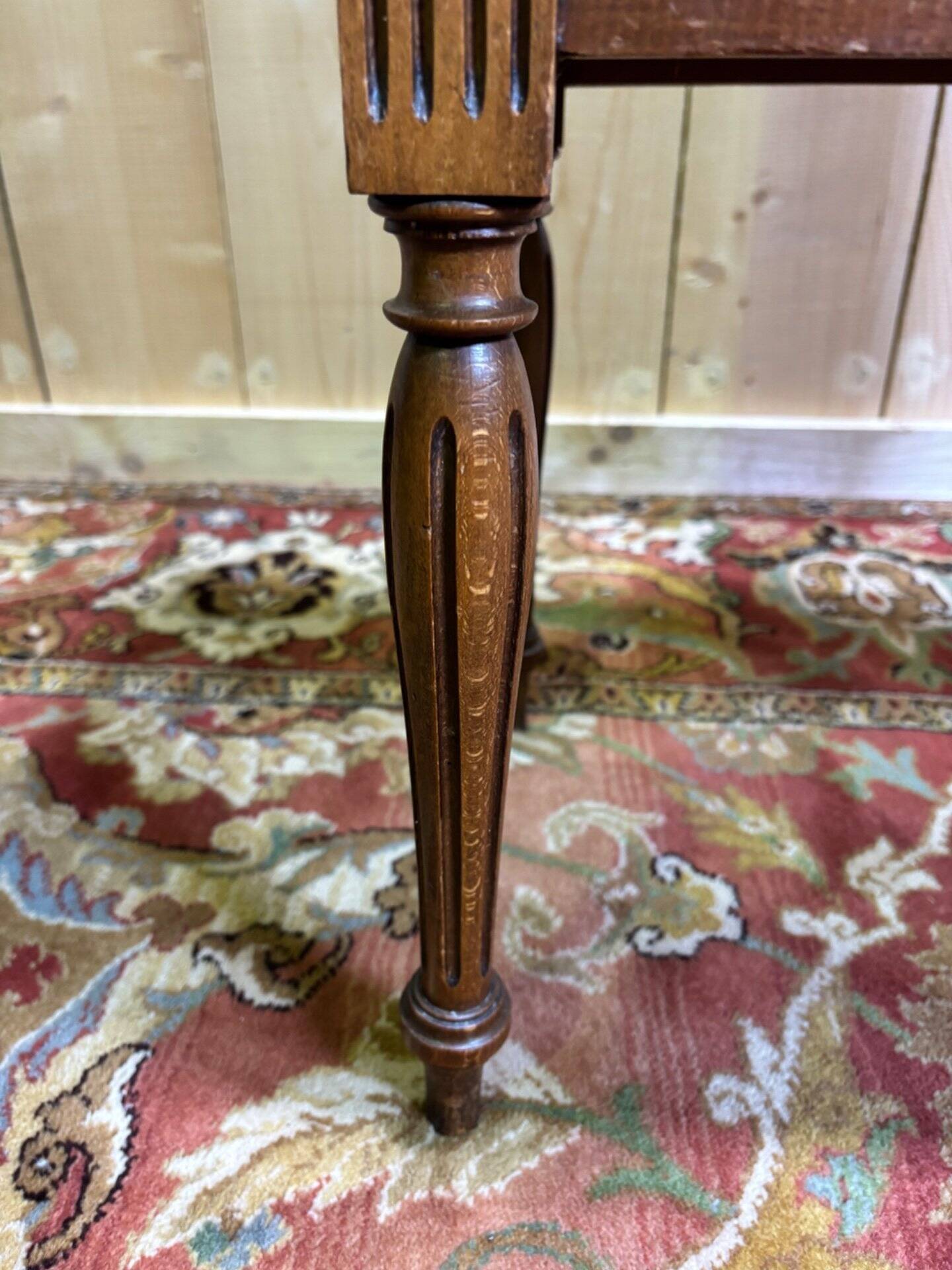 Louis XVI style molded and carved walnut chest of drawers