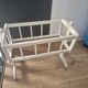 white wooden rocking cradle for baby or doll