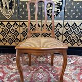 Suite de 8 chaises en cannage de style Louis XV