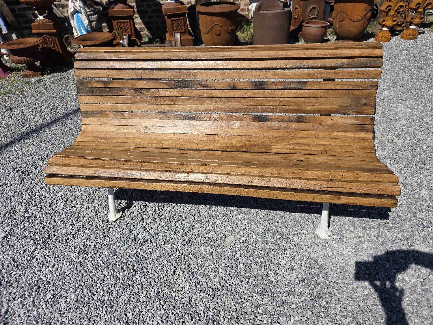 Antique garden bench made of cast iron and oak slats