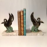 Art Deco bookends with metal swans, double patina and marble base.
