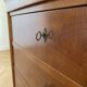 Antique solid wood chest of drawers with a secret drawer.