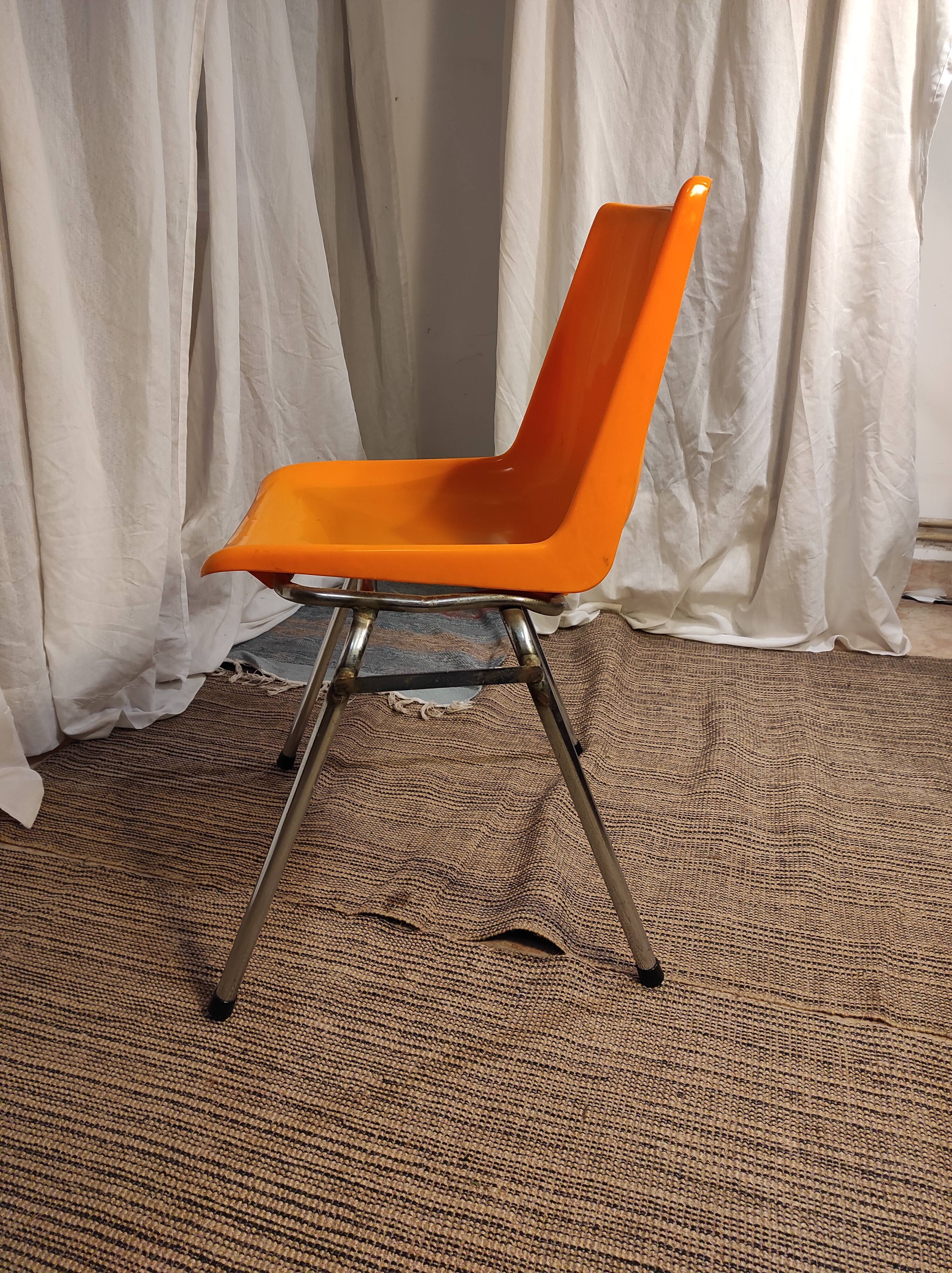 Orange plastic chair 1970
