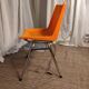 Orange plastic chair 1970