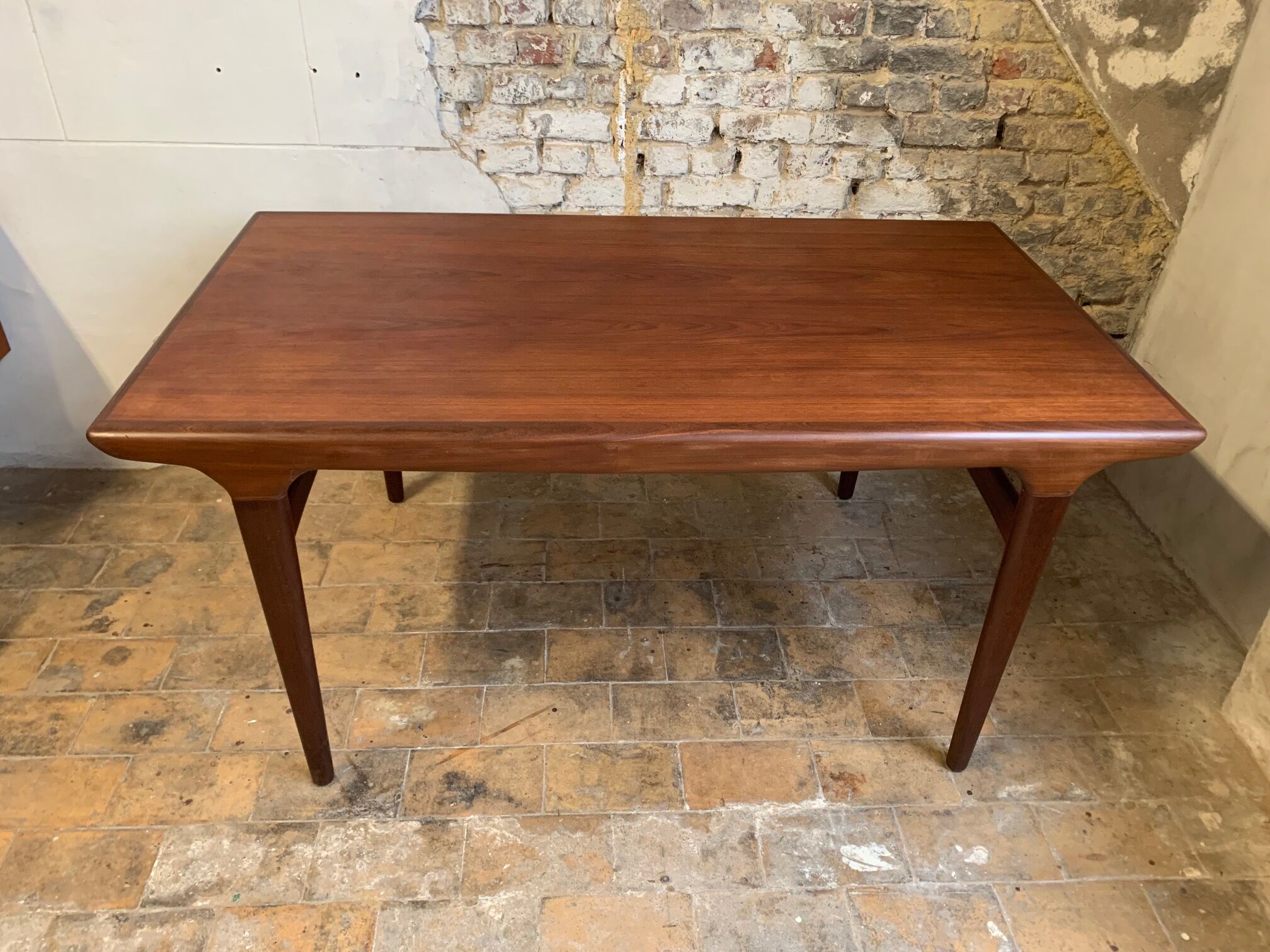 Dark teak dining table by Johannes Andersen for Uldum Møbelfabrik, Denmark