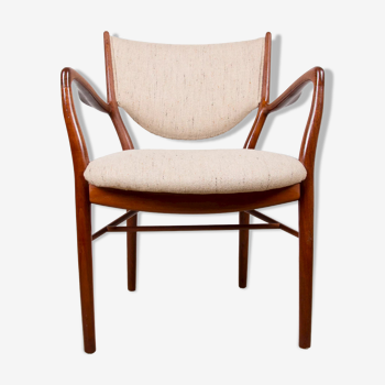 Fauteuil danois en teck et tissu modèle NV 46 par Finn Juhl pour Niels Vodder 1950.