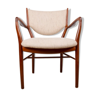 Fauteuil danois en teck et tissu modèle NV 46 par Finn Juhl pour Niels Vodder 1950.