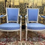 Paire de fauteuils cabriolets de style Louis XVI