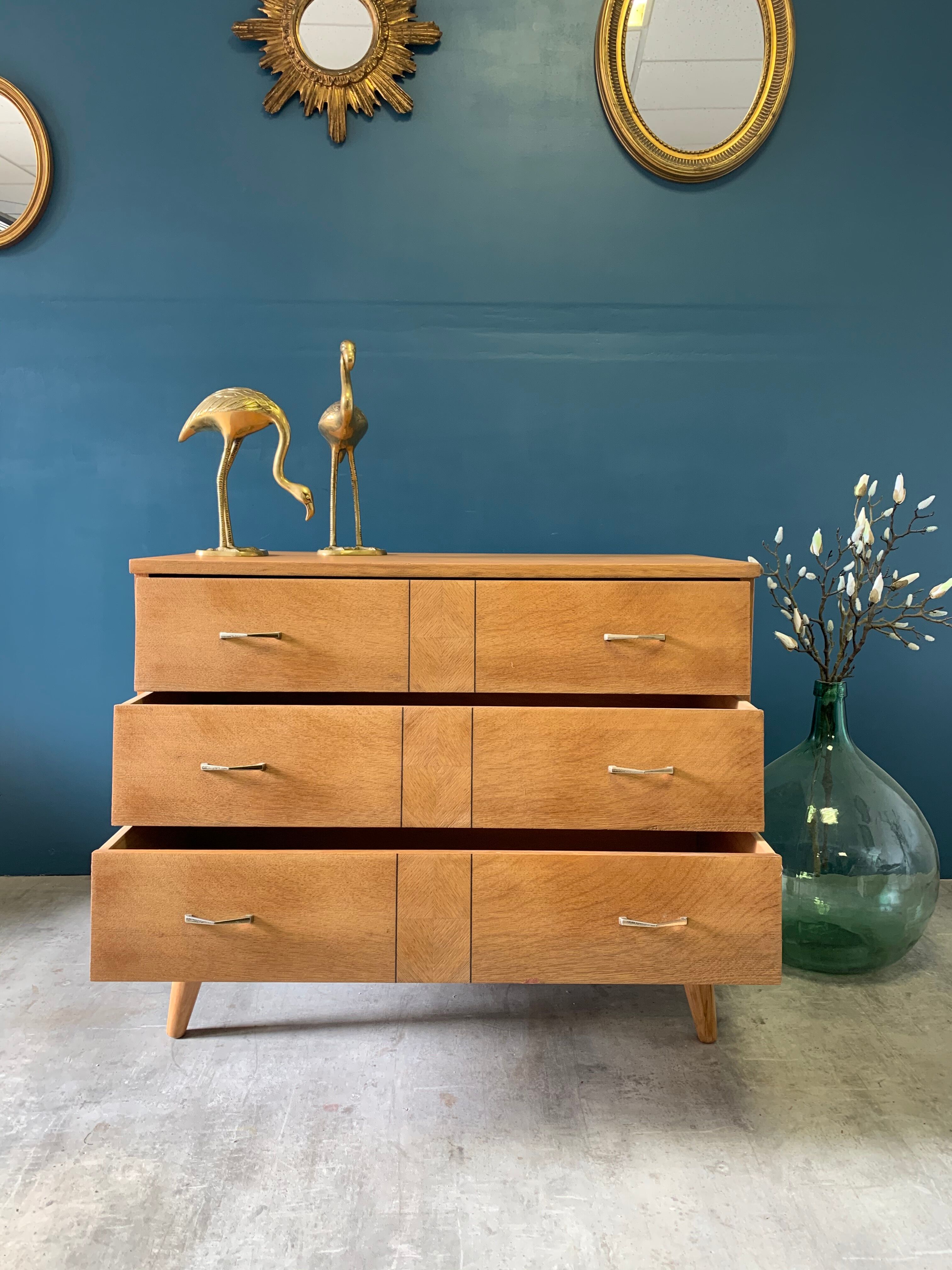 Vintage chest of drawers with wing drawers