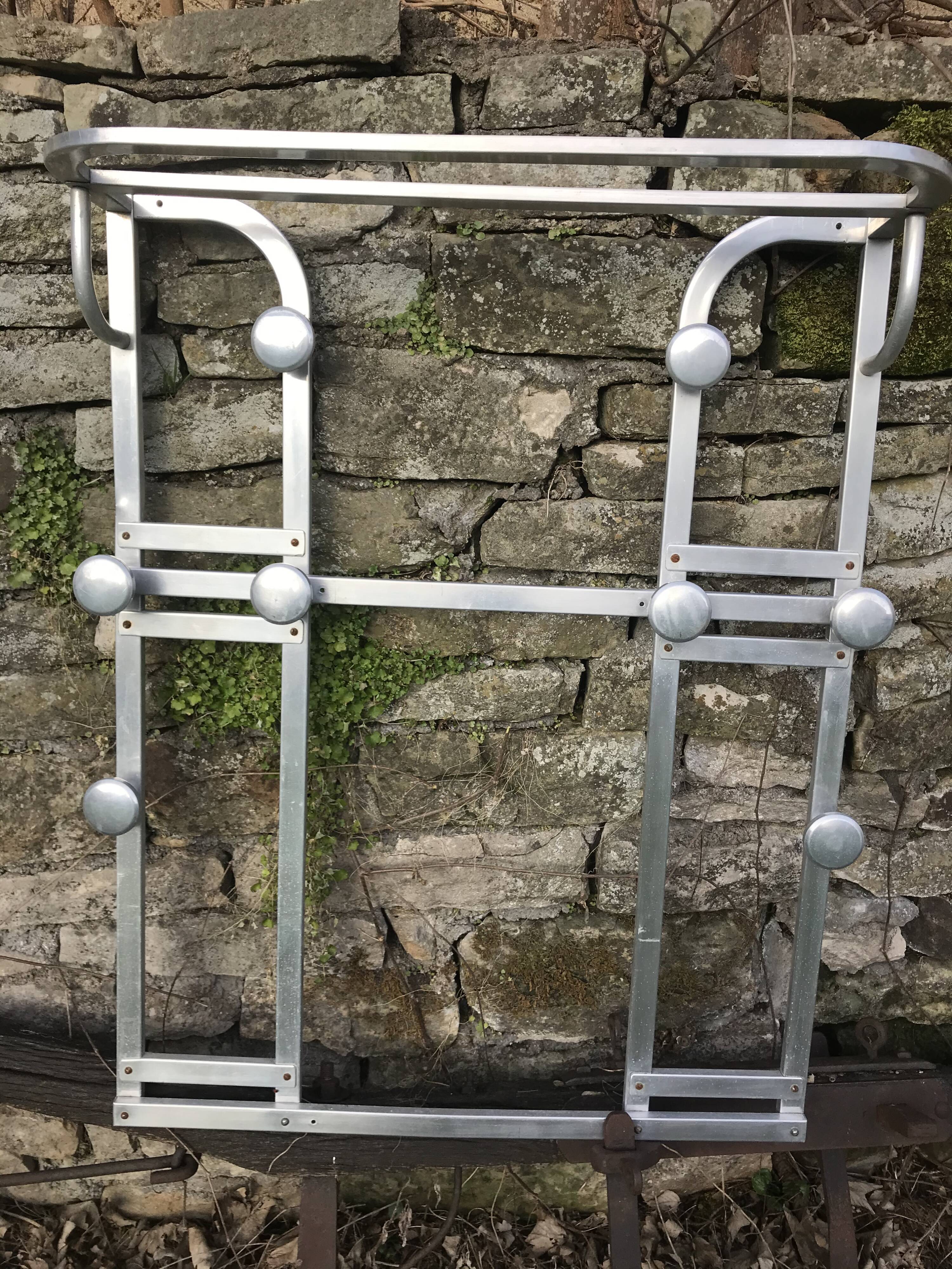 Vintage aluminum coat holder