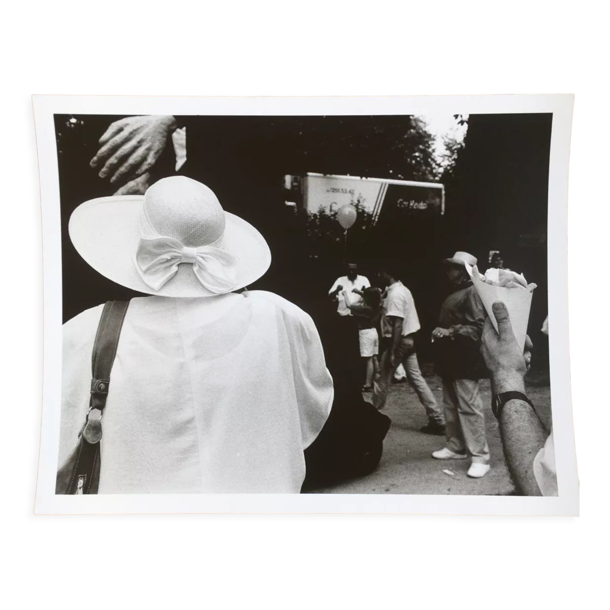 Photograph.woman with hat at funfair, 90s