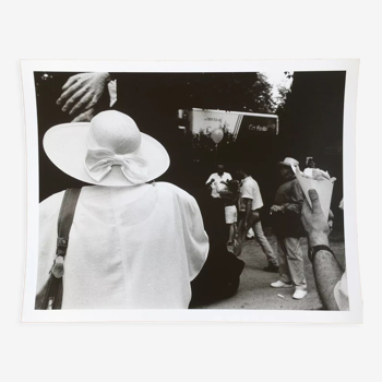 Photograph.woman with hat at funfair, 90s