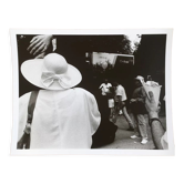 Photograph.woman with hat at funfair, 90s