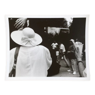 Photograph.woman with hat at funfair, 90s