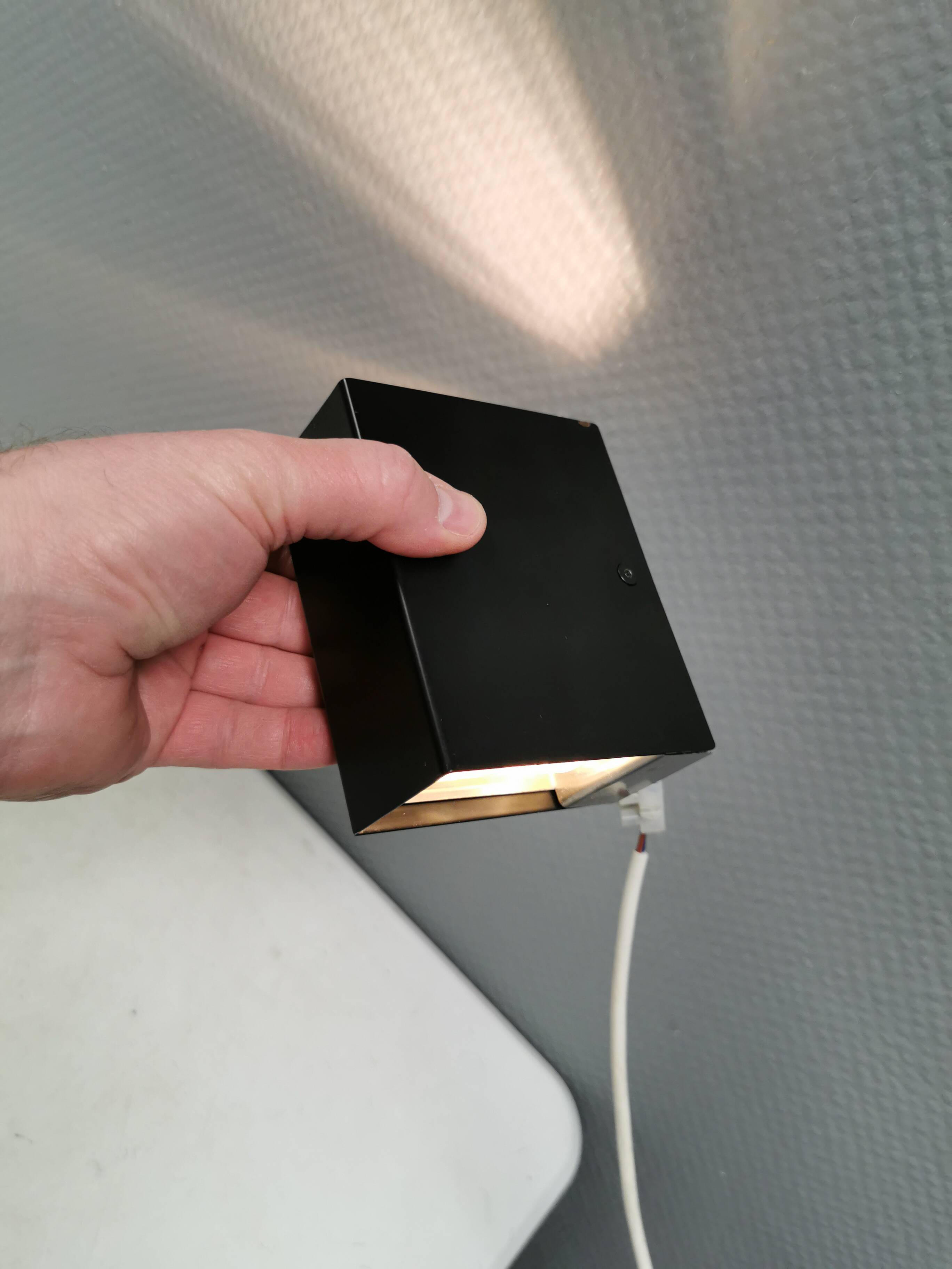 A beautiful up/down wall lamp, designed in Italy in the 1990s.