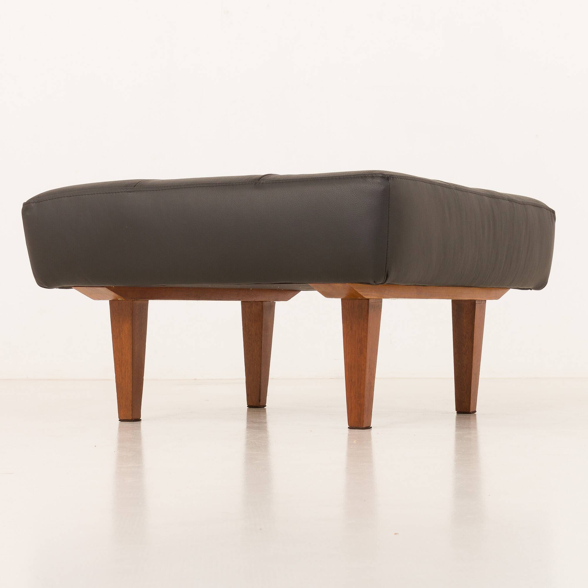 Mid century large ottoman in black leather, 1970s