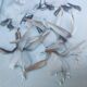 Two vintage paintings made with feathers, hummingbird motif
