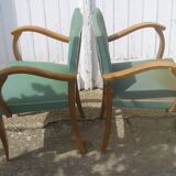 Paire de fauteuils bridge en skaï vert 1960