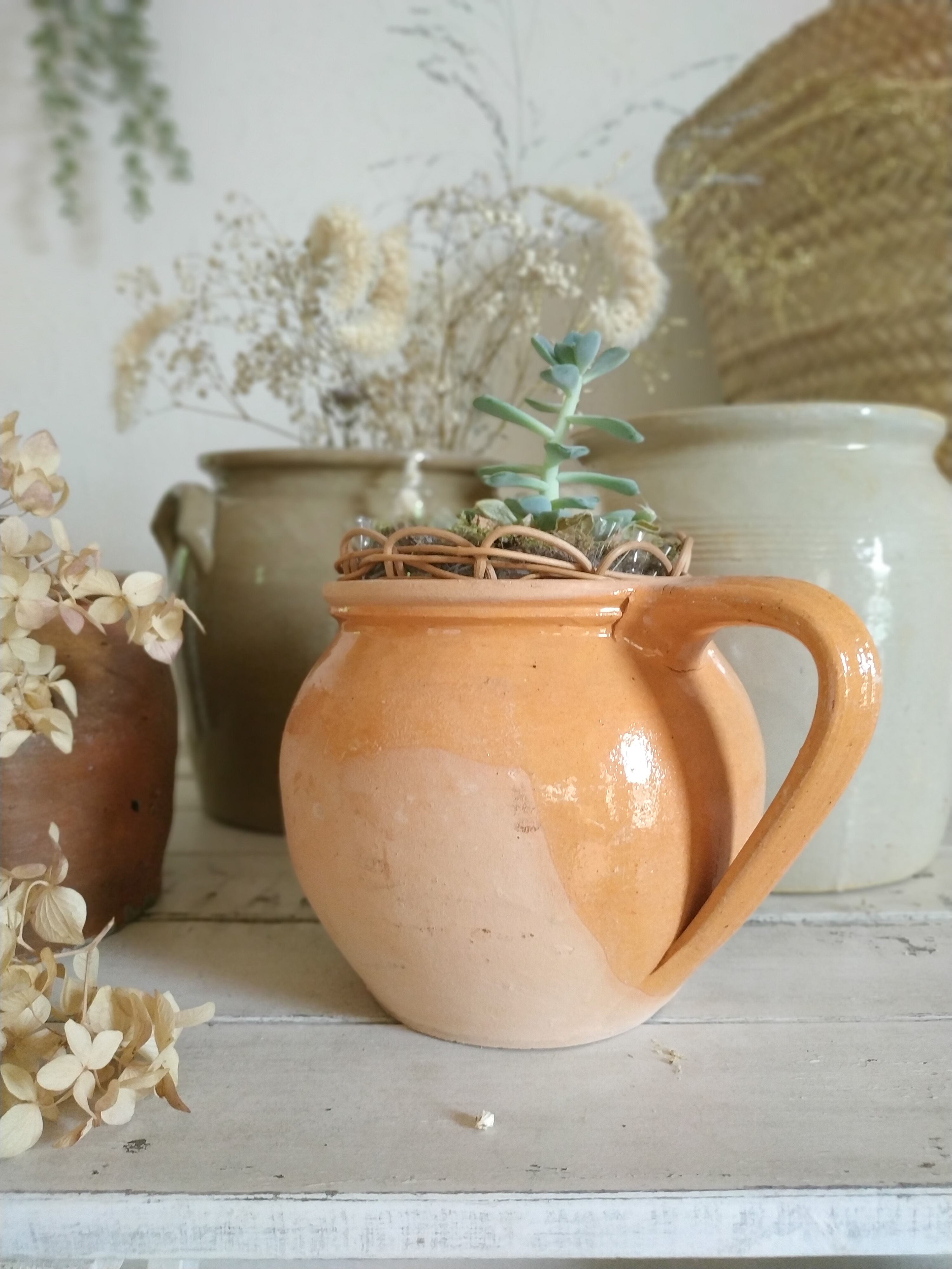 Old terracotta pot glazed ochre color