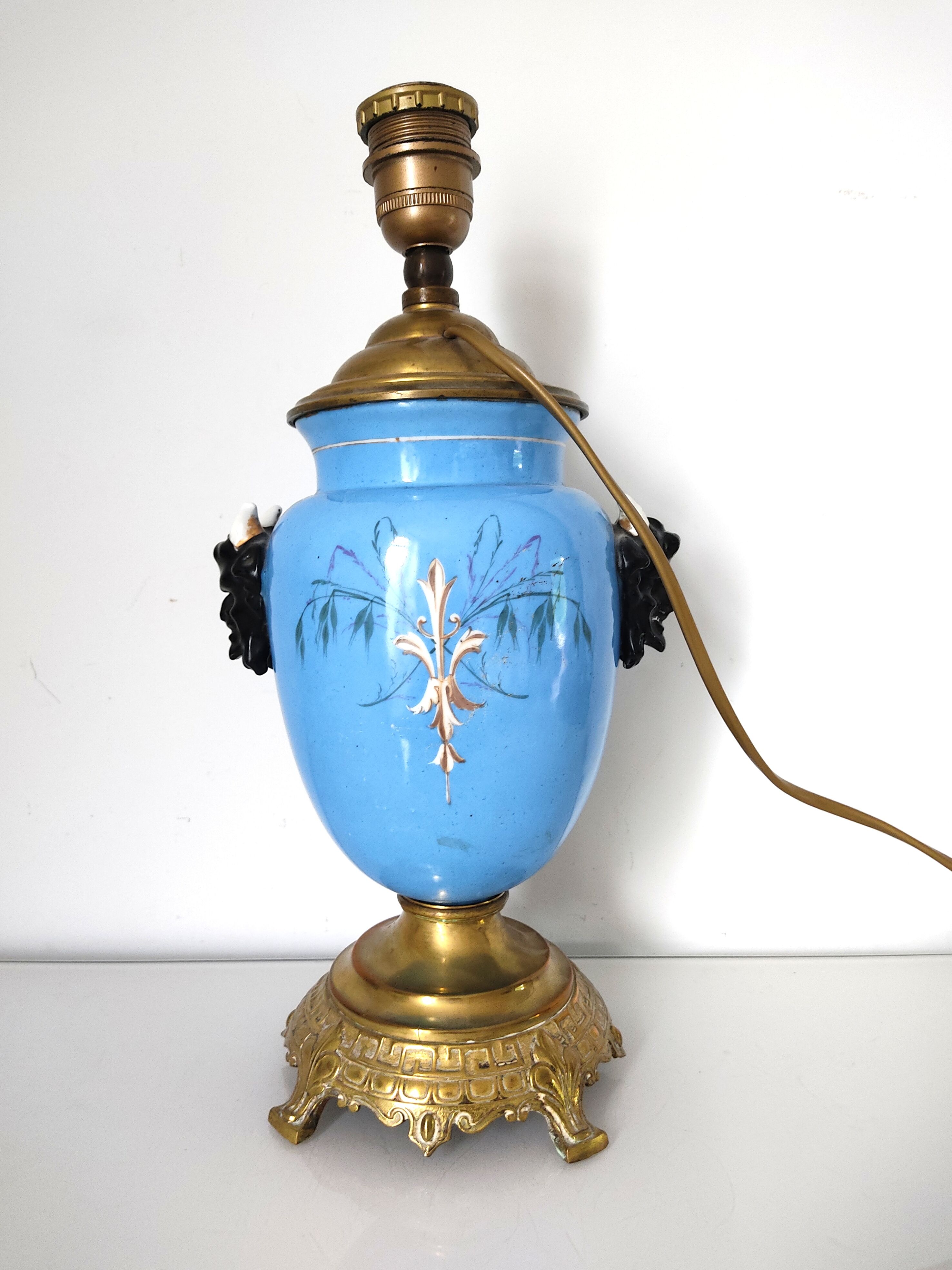 Lamp foot blue vase heads of fauna