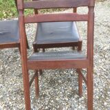 Vintage scandinavian teak chairs, black skaï seats as it is