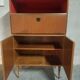 Teak bar cabinet and teak veneer, saddle leather and brass handles