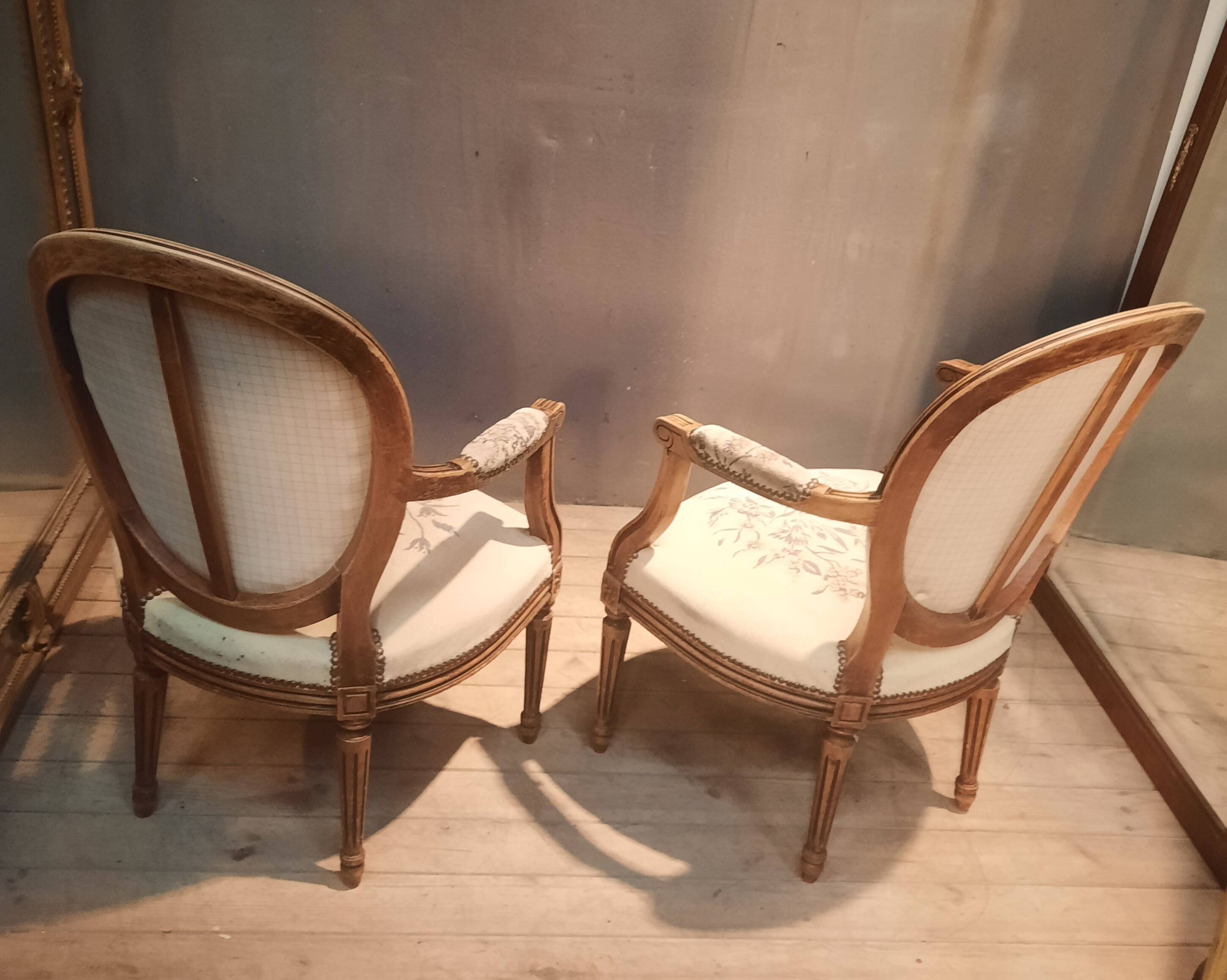 Pair of Louis XV style medallion armchairs.