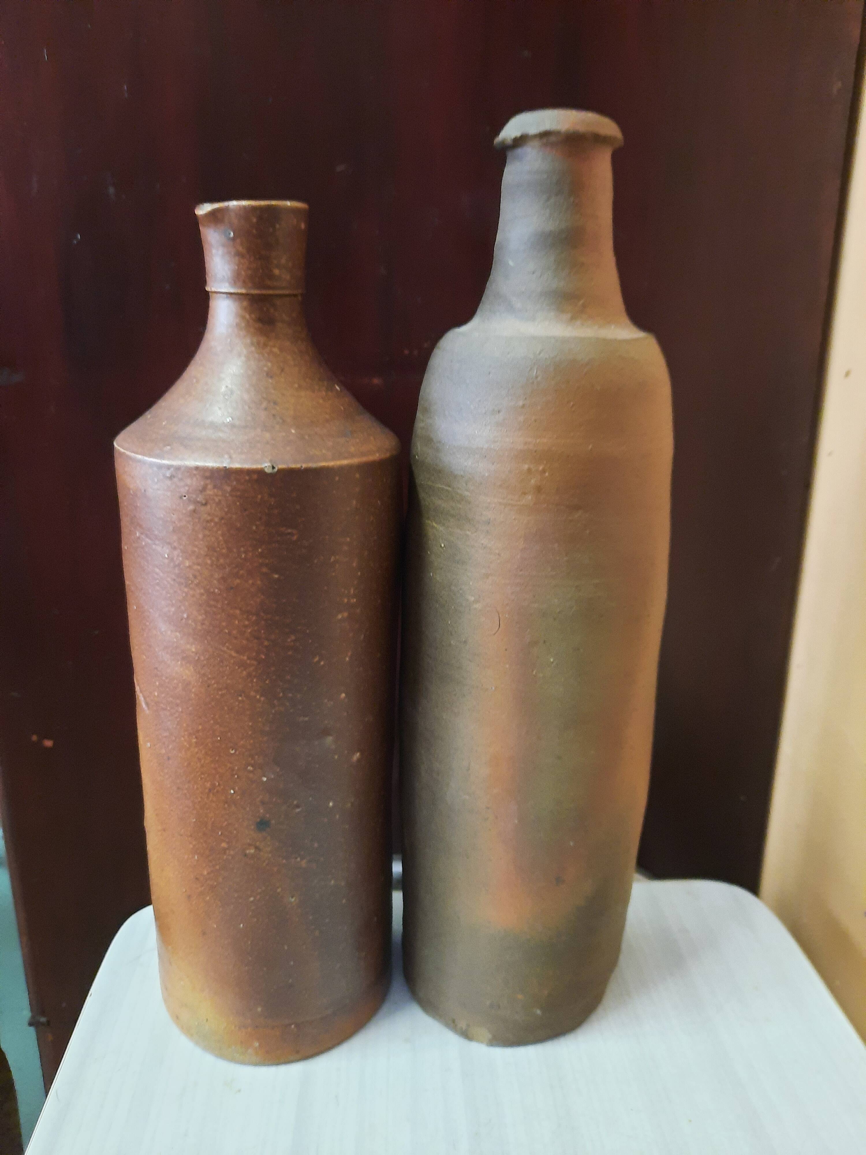 Duo of raw stoneware bottles