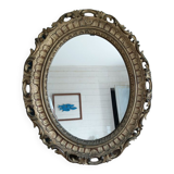 Mirror oval frame carved gilded patinated