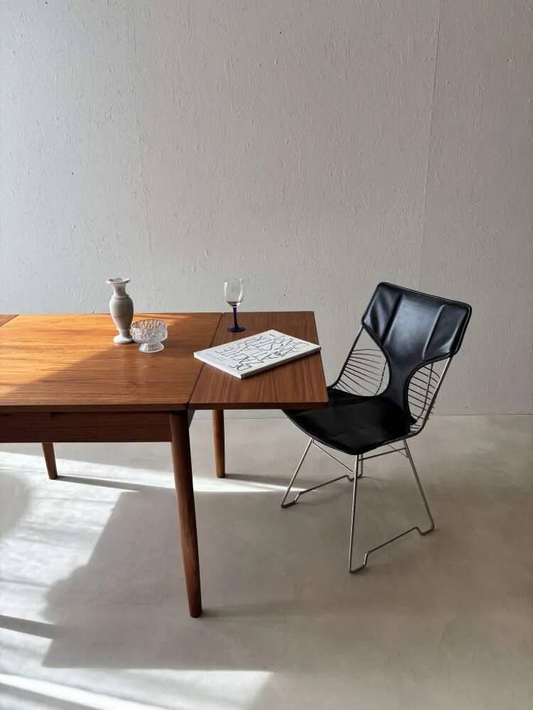 Scandinavian design dining table in solid teak from the 1960s.