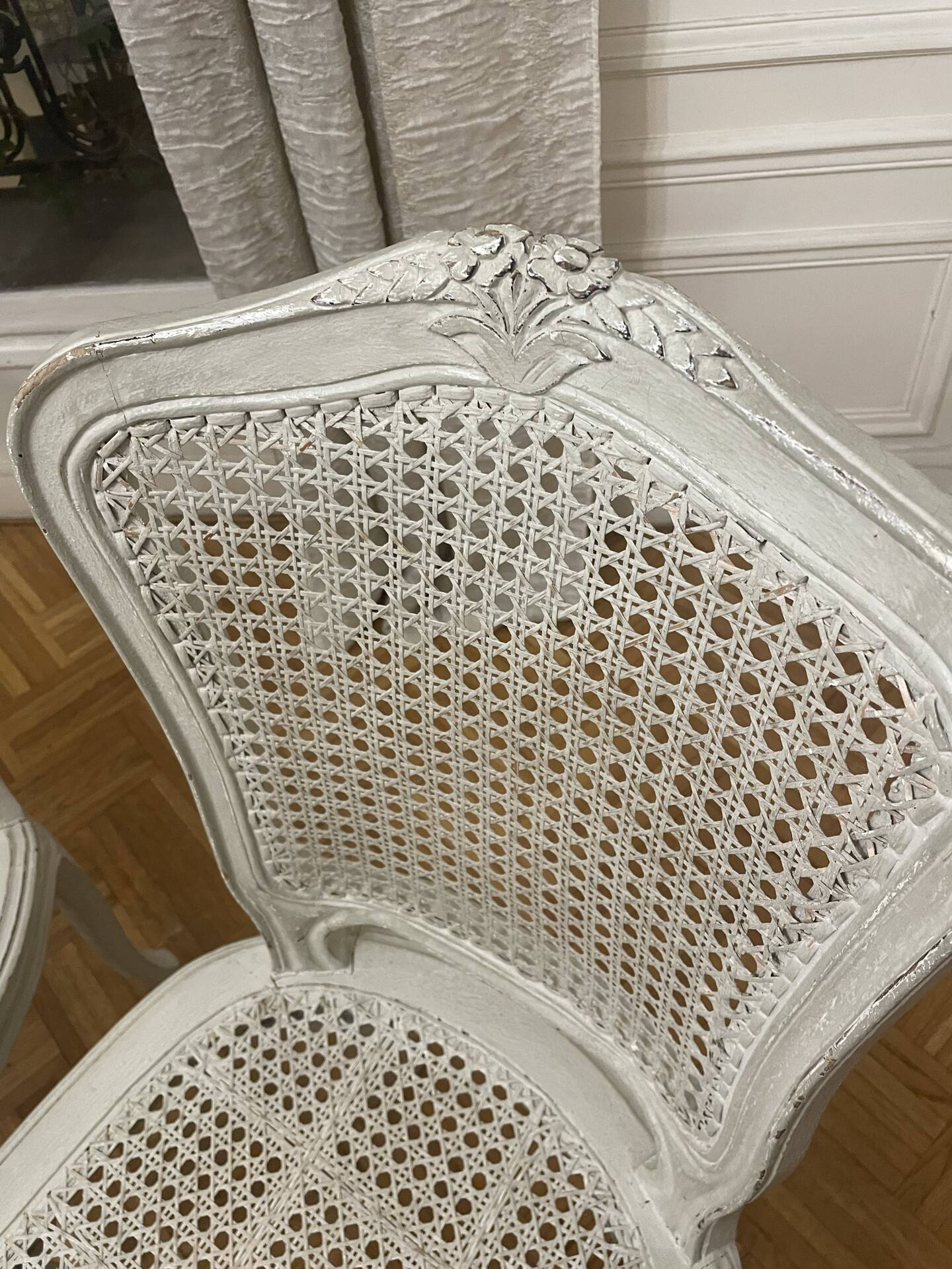 Set of 4 white caned chairs in Louis XV style.