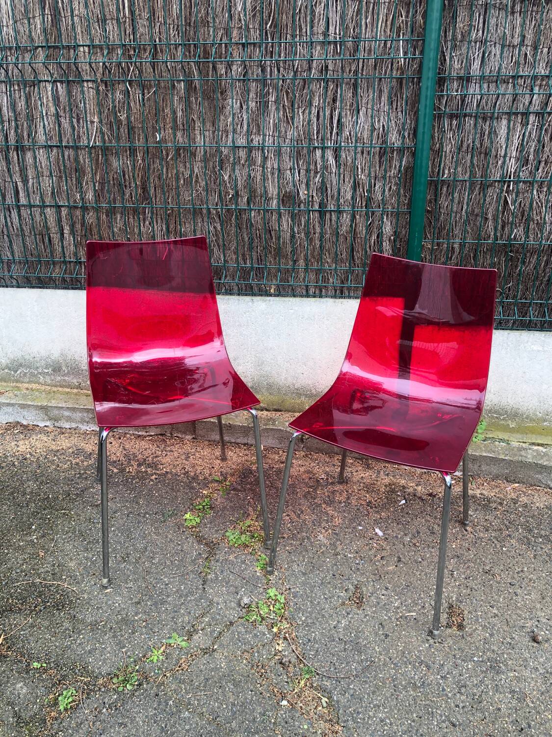 Pair of Foschia Plexiglas red designer chairs