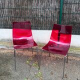 Pair of Foschia Plexiglas red designer chairs
