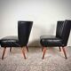 Pair of vintage club armchairs in black leatherette – 1950s