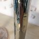 Pair of hammered metal candlesticks