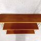 Vintage wall shelf in teak and golden brass String Tomado style