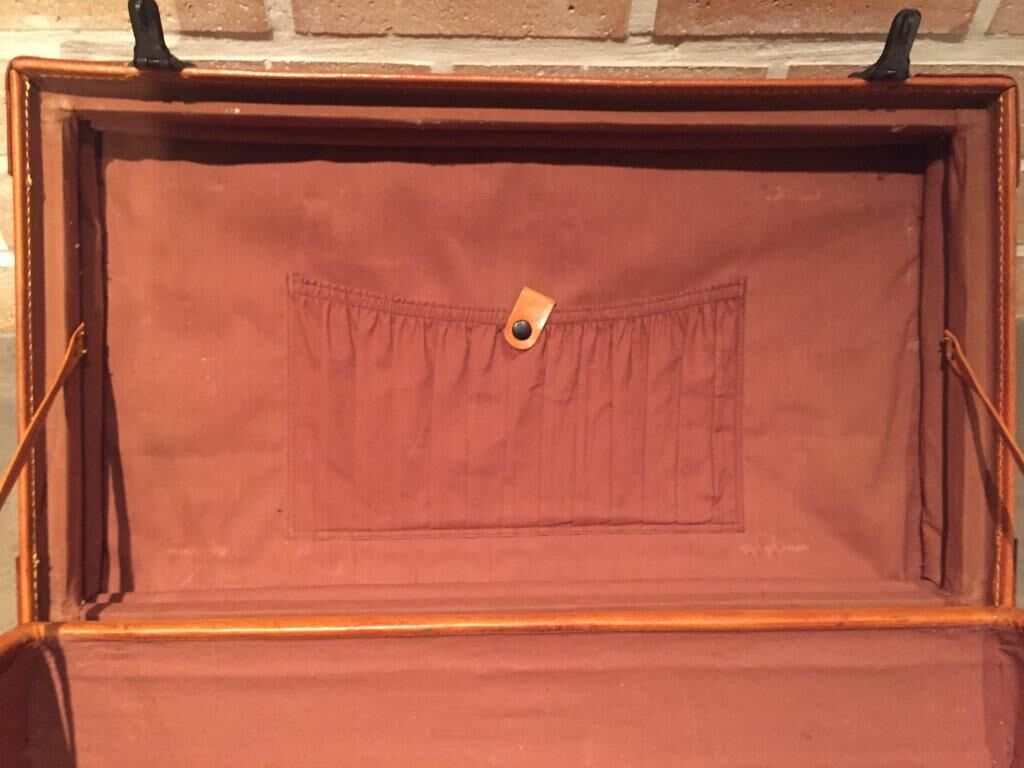 Thick leather suitcase