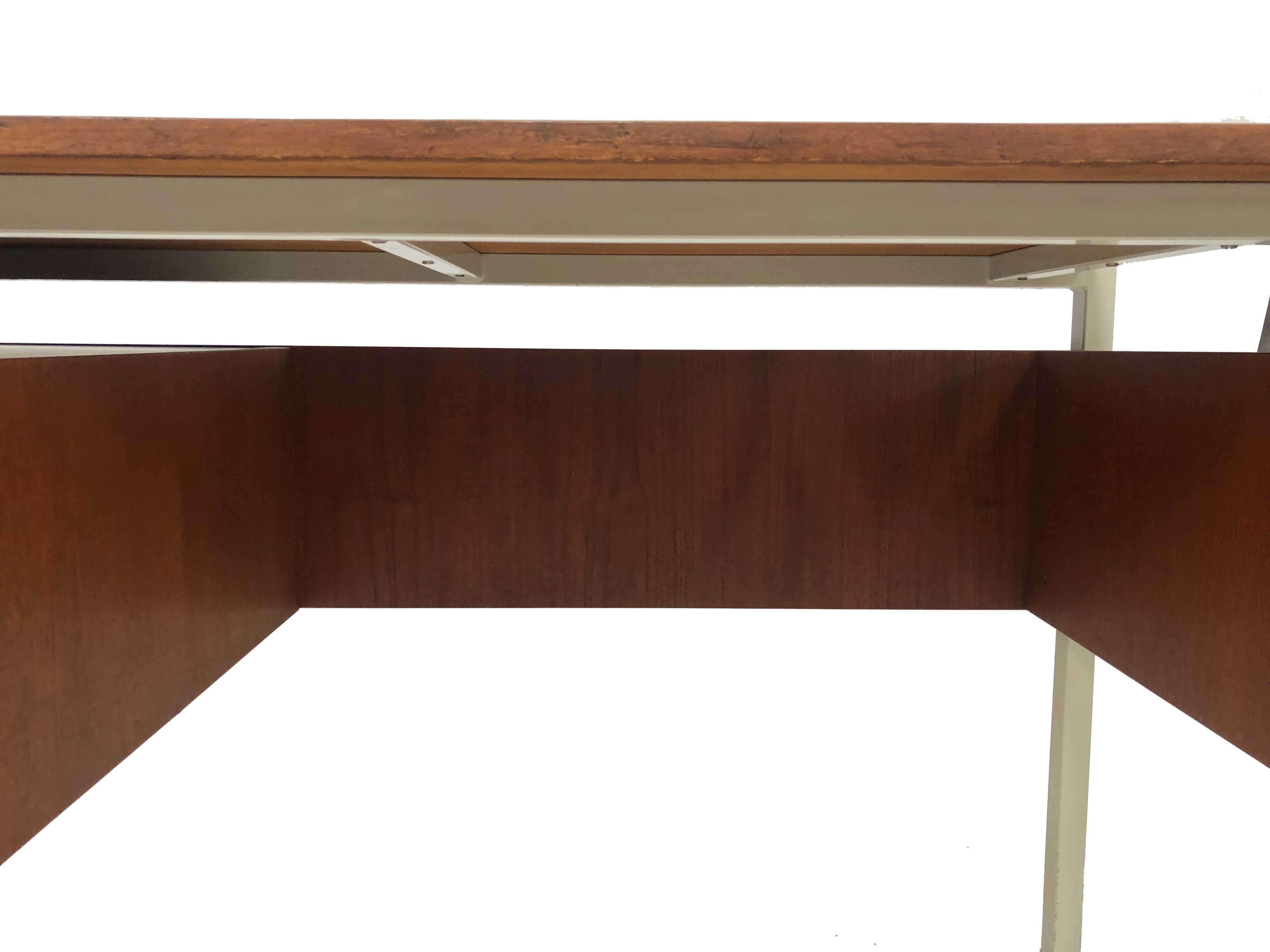 Vintage desk of the 1960s in teak veneer