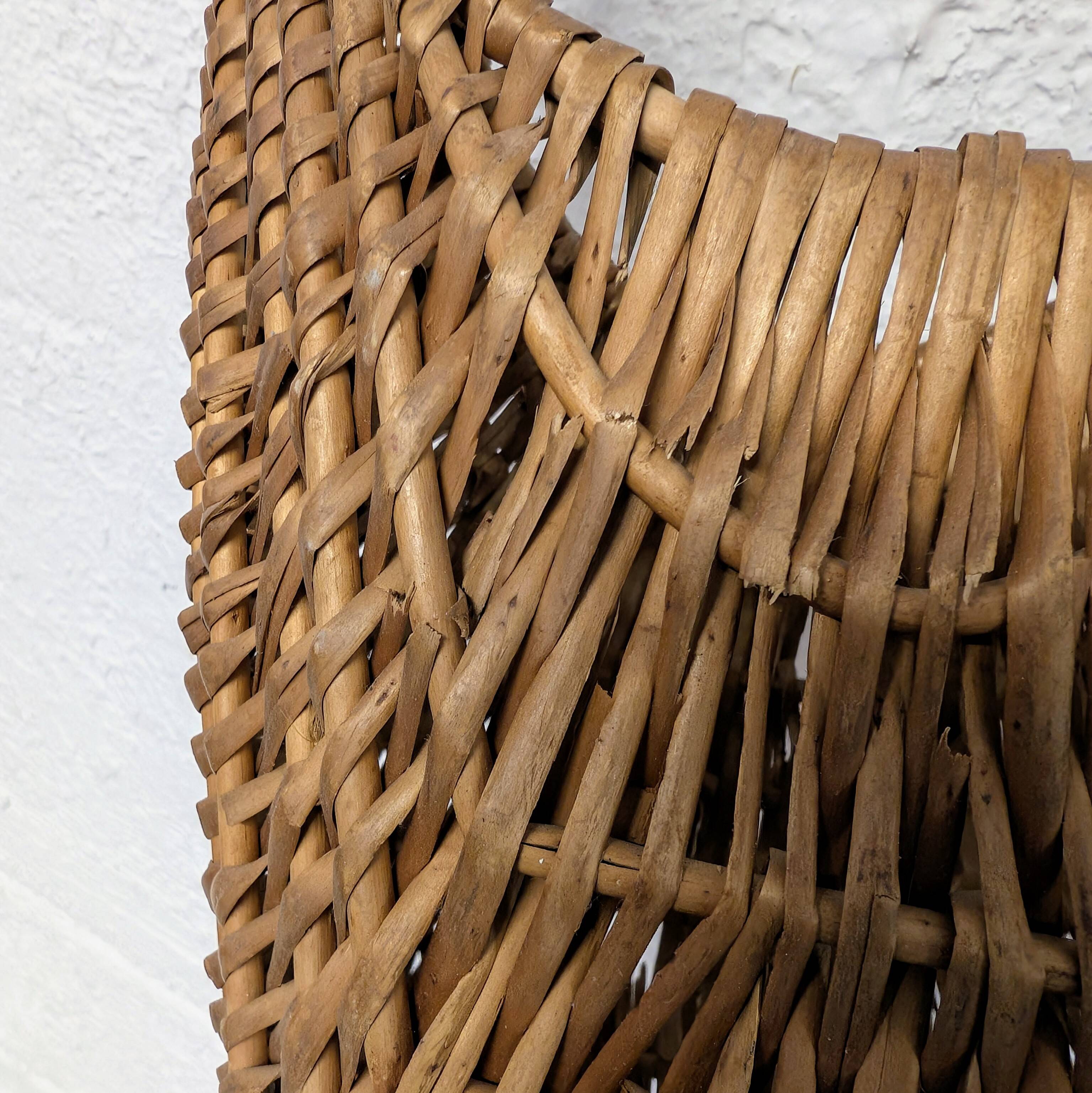 Large-handled woven wicker basket