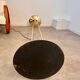 Old golden brass floor lamp with Italian design bulb from the 70s vintage