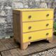 Commode art déco jaune poudré et bois brut