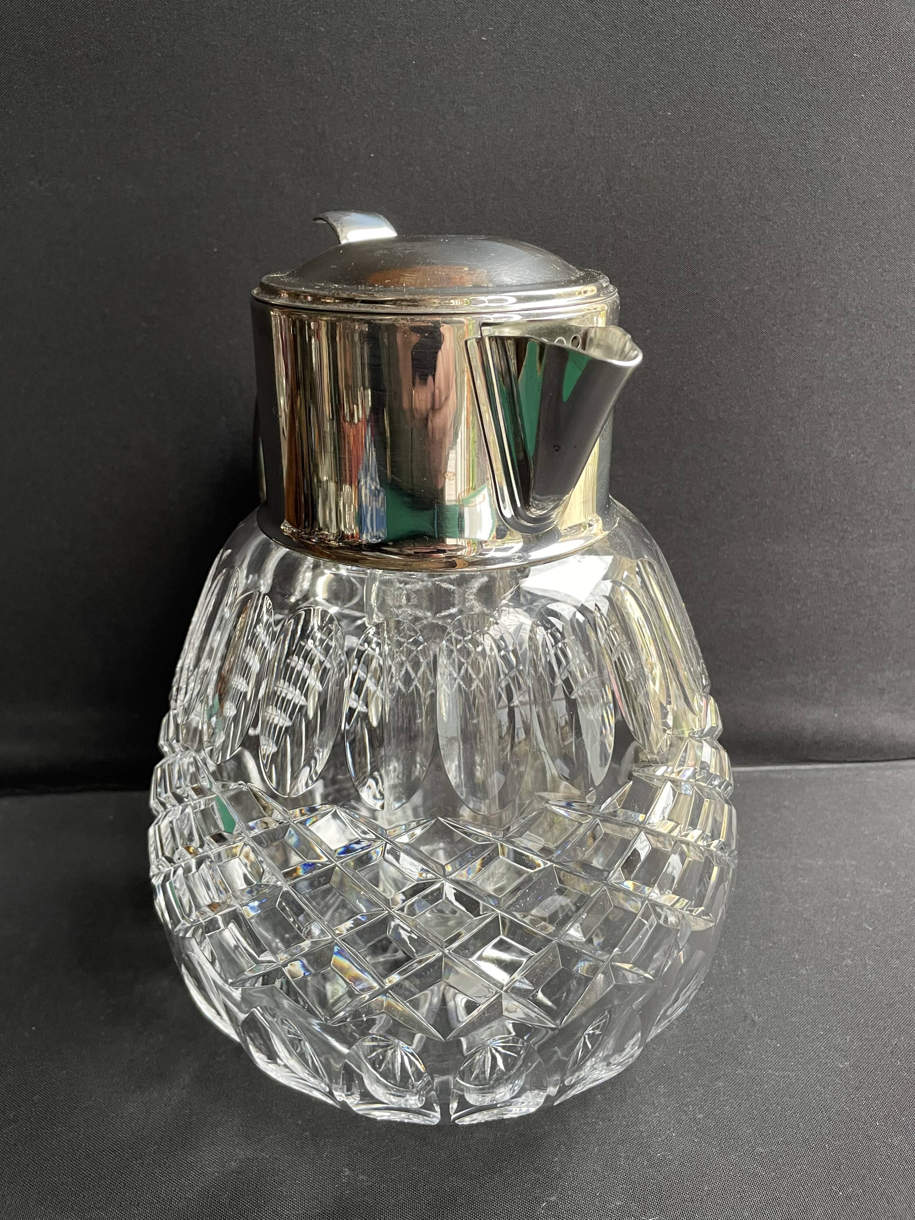 Important jug with ice reserve in cut crystal and silver-plated metal