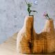 Hand-carved soliflore vase in solid lime wood.