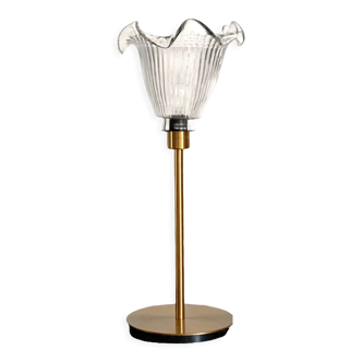 Table lamp with a vintage antique globe in ridged glass mounted on gilded stand